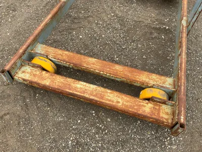 Metal Two Sided Cantilever Rack, on wheels so it can roll sideways, welded together, arms stick out ...