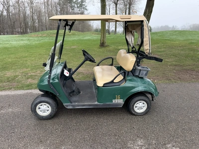 (1) 2015 E-Z-Go golf cart with a Kawasaki gas engine, includes ball washer and Club canopy, ball cov...