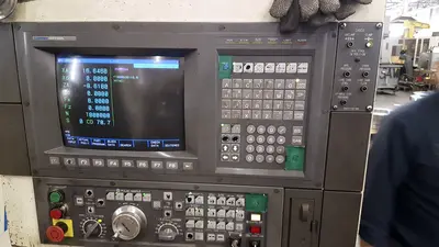 Used 1995 OKUMA LU-45 CNC Lathes Illinois US | Machinery Marketing International #379048