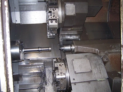 USED 2000 OKUMA IMPACT