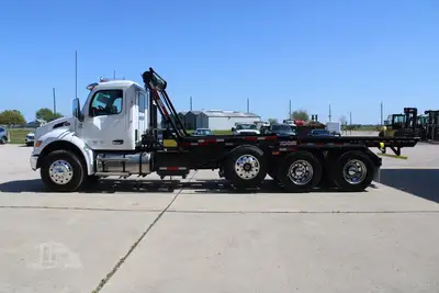 New | in-Stock 2027 PETERBILT 548 Rolloff Trucks Texas US | Roll Off Truck World #1492012
