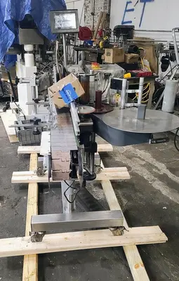 USED CVC 300 PRESSURE SENSITIVE WRAP LABELER