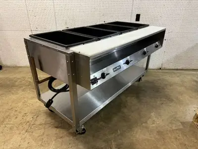 Used Vollrath Used 61" Vollrath 38104 ServeWell Electric Four Pan Sealed Well Hot Food Table 120V - TH1 Steam Tables (Food) Illinois US | Falcon Restaurant Supply #1374829