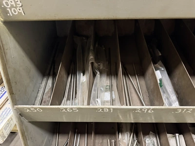 (1) metal rack, 36" wide x 18" deep x 60" tall, with contents of assorted ejector pins.