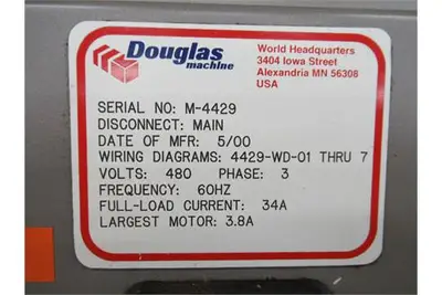 Douglas case packer with controls and magazine