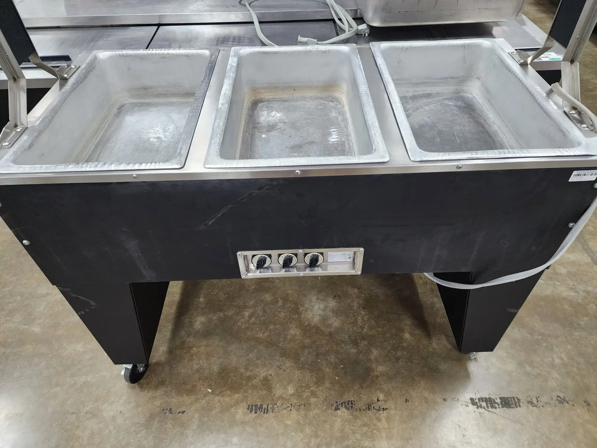 Used SuperMetal Used SuperMetal 3 Pan Open Well Heated Buffet Hot Food Steam Table with Open Base 208V Steam Tables (Food) Illinois US | Falcon Restaurant Supply #1376669