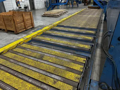 51' Powered Floor Mounted Exit Conveyor