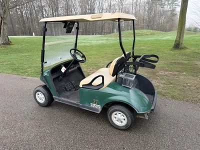 (1) 2015 E-Z-Go golf cart with a Kawasaki gas engine, does not include Club canopy, includes ball wa...
