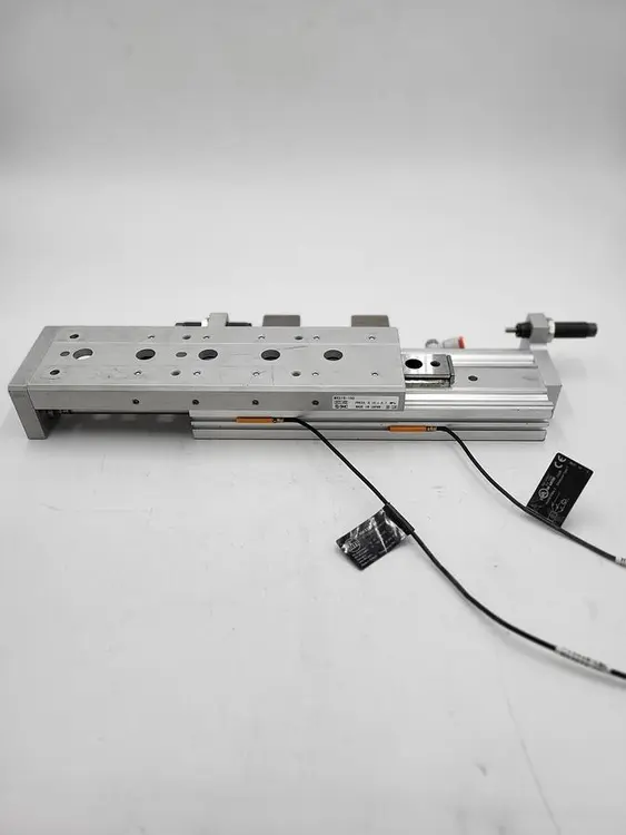 Used SMC SMC MXS16-100 PNEUMATIC SLIDE TABLE - STROKE 100MM Linear Guides | ND Industrial Surplus #1215837