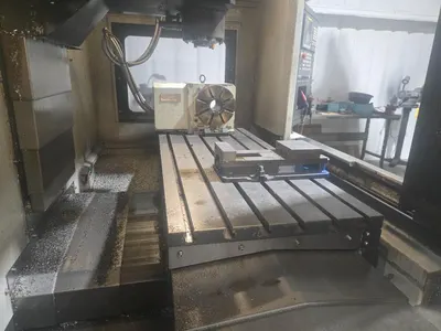 2018 Leadwell V-50i VMC w/ 30-Slot ATC, Conveyor, Kurt Vise, Fanuc Oi-MF Controller