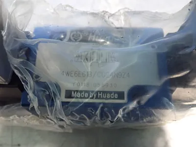 USED HUADE 4WE6E61B