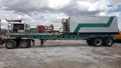 USED NATIONAL JWS-165L TRIPLEX WELL SERVICING REVERSING MUD PUMP TRAILER