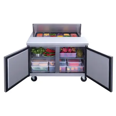 New | in-Stock Dukers New Dukers DSP48-12-S2 2-Door Commercial Food Prep Table Refrigerated in Stainless Steel Food Prep Tables Illinois US | Falcon Restaurant Supply #1376290
