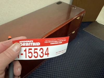 Contents of office furniture, includes (1) wood desk with glass top, 71" x 36", (1) wood credenza wi...
