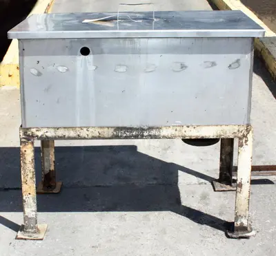 SPC7647  Miscellaneous Equipment bottle dump station Stainless Steel 28 each 1-3/8" diameter holes, 16"W x 32"L x 15 3/4"D