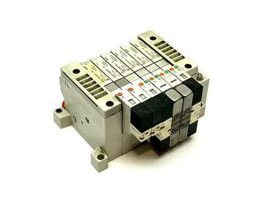 VV5Q11-06N7FU0-S | SMC  Manifold Base w/ Solenoids - For parts or not working