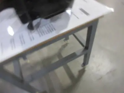 ROLLING METAL TABLE WITH PAPER JOGGER