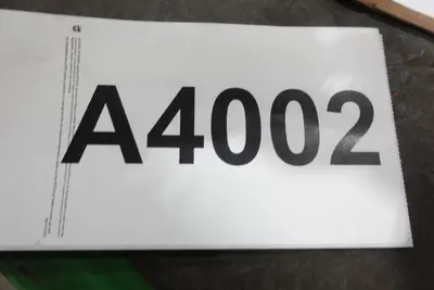 PALLET OF ASSORTED OFFICE SUPPLIES, TONER, LABEL PRINTERS, PACKAGING MACHINE, PHONE, SIGNAGE