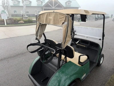 (1) 2015 E-Z-Go golf cart with a Kawasaki gas engine, includes canopy, ball cover, club cover, fold-...