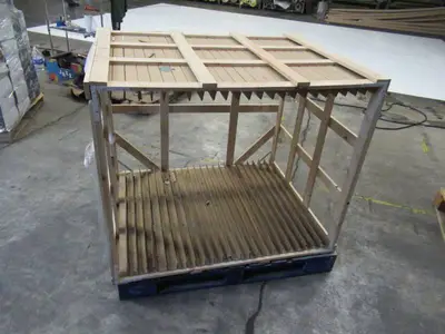 Large Wooden Frame Built onto Pallet with Slits for Separating Items