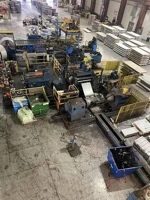 54” x .108” x 40,000 Lbs. Loopco Slitting Line (Used)