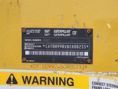 Used 2004 CATERPILLAR 990 Skid Steer Loaders British Columbia CA | Lenmark #277799