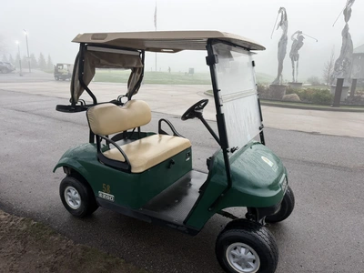 (1) 2017 E-Z-Go golf cart with a Kawasaki gas engine, model 625111G01, includes canopy, ball cover, ...