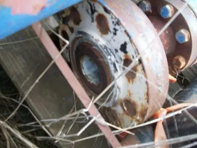 USED NIXCO 2" INLINE FLOW THRU PULSATION DAMPENER / ACCUMULATOR