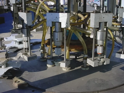 USED 12 HEAD ROTARY VACUUM FILLER 12 HEAD