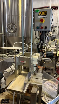 Wild Goose 4 head filler and seamer with depalletizer