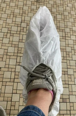 Disposable Shoe Covers White (Large Lot 12 Of These Are Non Slip) Size ?