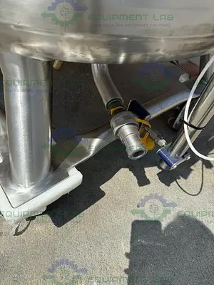 USED PRECISION 250 LITER STAINLESS STEEL JACKETED REACTOR 45 PSI W/ LIGHTNIN MIXER.