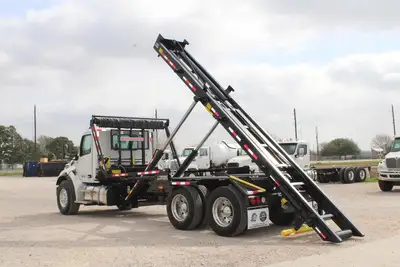 New | in-Stock 2027 PETERBILT 548 Rolloff Trucks Texas US | Roll Off Truck World #1492003