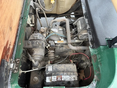 (1) 2015 E-Z-Go golf cart with a Kawasaki gas engine, includes canopy, ball cover, club cover, fold-...