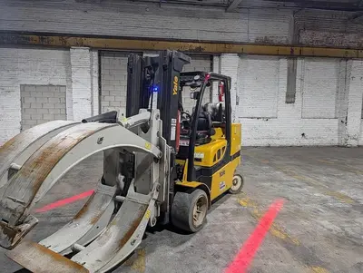 12,000 POUND YALE GLC120VX FORKLIFT TRUCK WITH 84" CASCADE PAPER CLAMP
