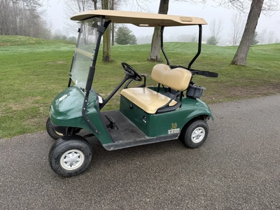 (1) 2015 E-Z-Go golf cart with a Kawasaki gas engine, does not include Club canopy, includes ball wa...