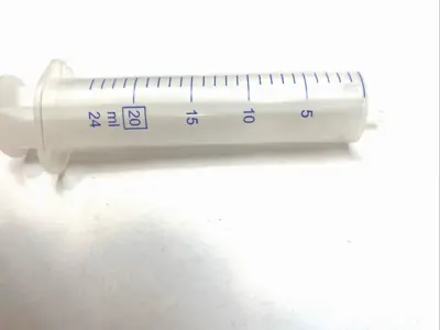 USED FISHER SCIENTIFIC LUER‑SLIP SYRINGE 20ML