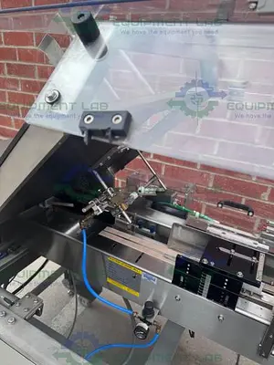 USED ECONOSEAL E SYSTEM 2000 ECONOSEAL CARTONER W/  HOT GLUE SEALING