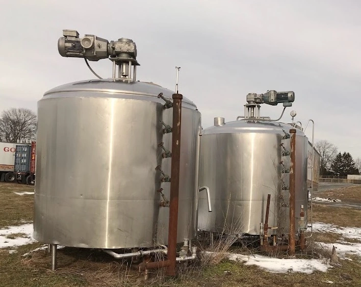 Used 1500 gallon stainless steel jacketed Mojonnier kettles