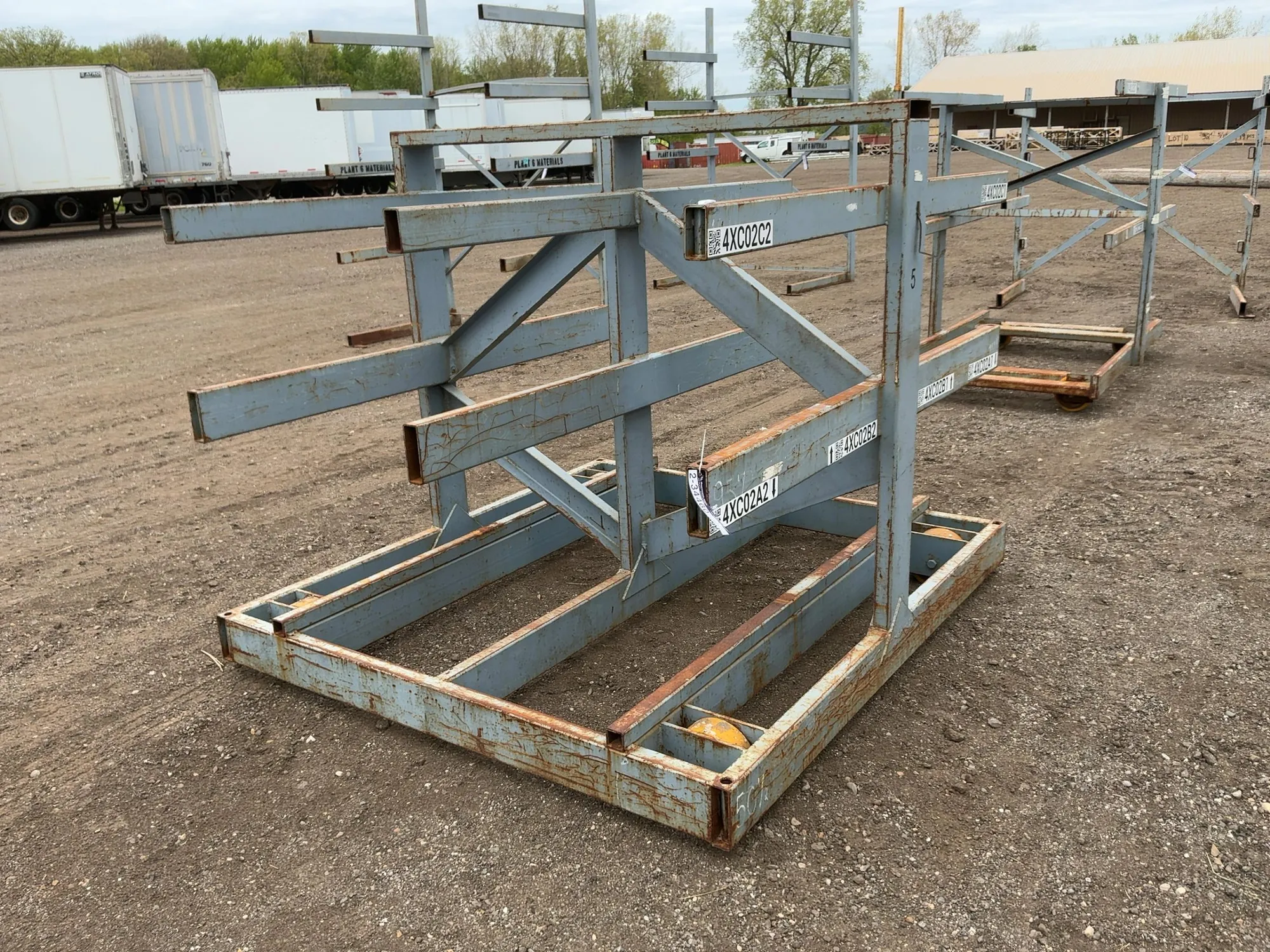 Metal Two Sided Cantilever Rack, on wheels so it can roll sideways, welded together, arms stick out ...