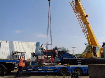 Supply Labour And Lifting Equipment To Unload Machines From Transport