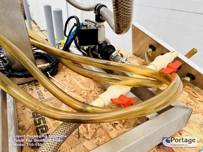 USED 2010 LIQUID PACKAGING 310-150 TT OVERFLOW FILLER