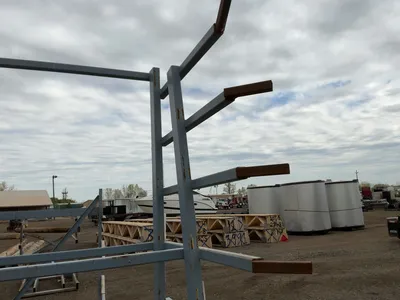 Metal 8-Tier Cantilever Rack, welded together, arms stick out approx. 20” and have metal brackets th...