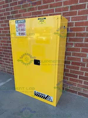 USED JUSTRITE 45 GALLON FLAMMABLE LIQUID STORAGE CABINET W/ SOFT CLOSE DOORS, KEY