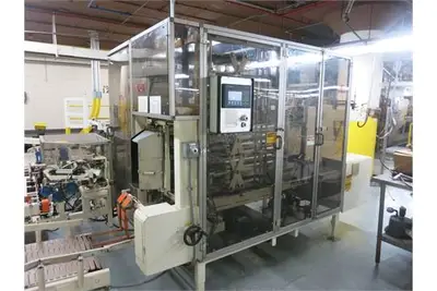 Package Machinery Dyna Pak-S28 vertical case packer w/ controls