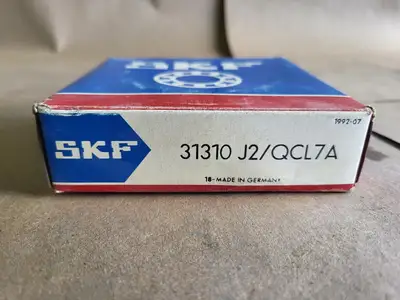 NEW SKF 31310 J2/QCL7A