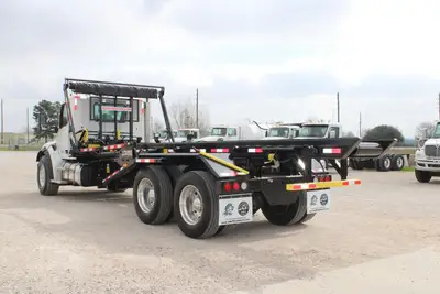 New | in-Stock 2027 PETERBILT 548 Rolloff Trucks Texas US | Roll Off Truck World #1492003