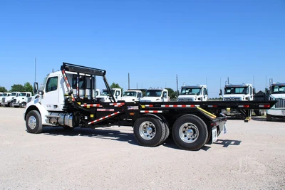 New | in-Stock 2027 PETERBILT 548 Hooklifts & Roll-Offs Texas US | Roll Off Truck World #1492004