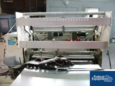 USED OMEGA OMEGA SHRINK BUNDLER, MODEL DL 27