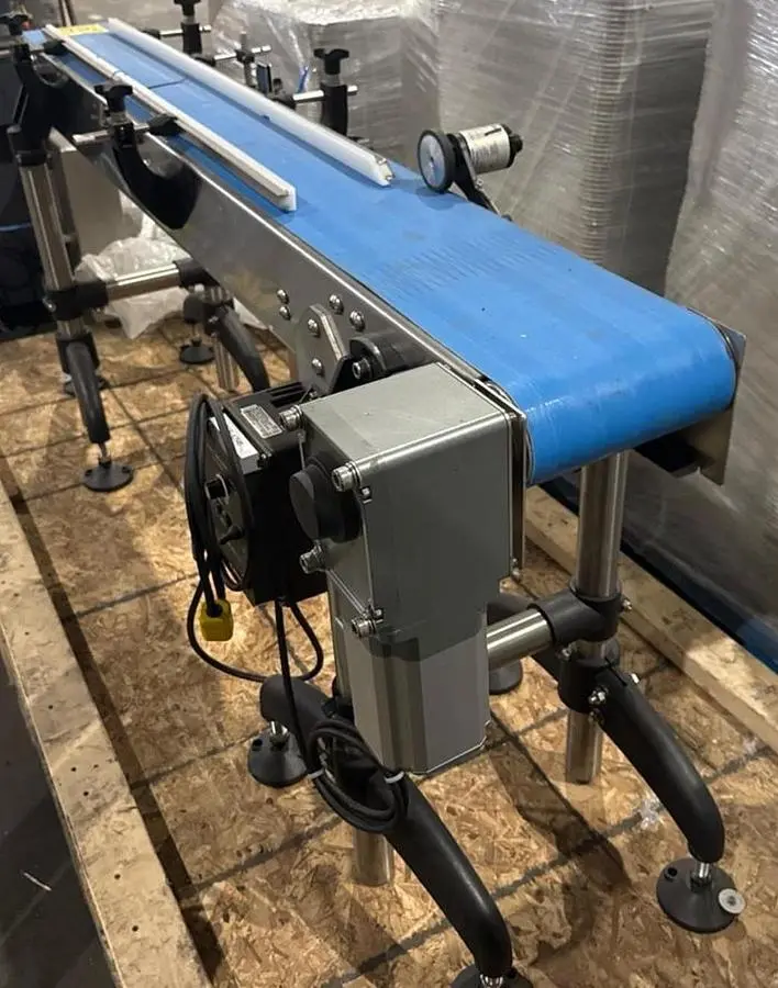 Used Stainless Steel 71” long x 8-1/2” wide motorized conveyor